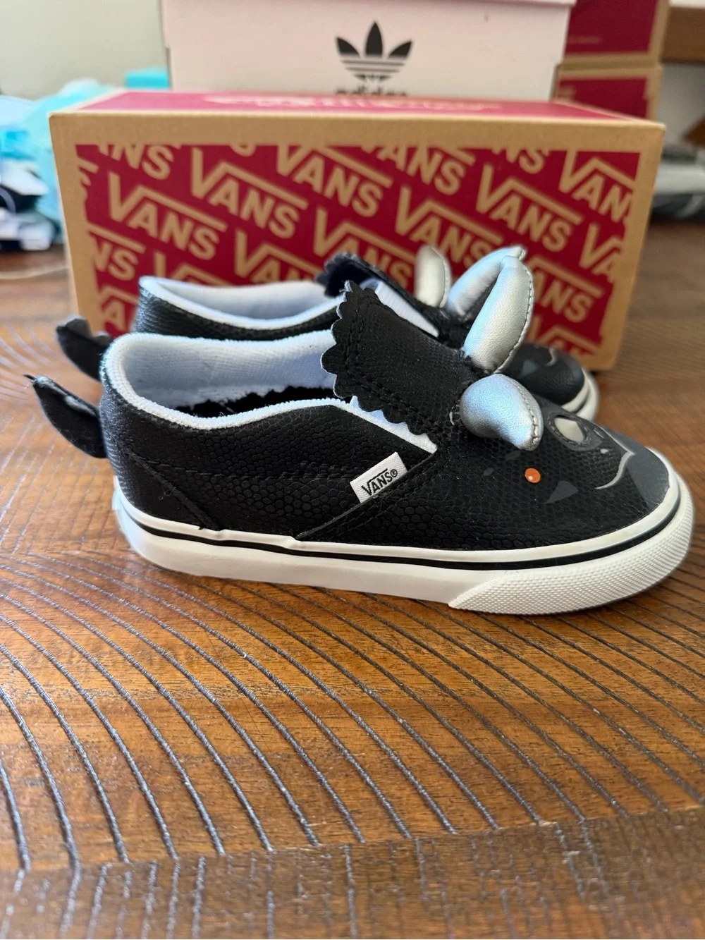 Vans Kids Black Rhino Slip-On Sneakers with Silver Horn Accents